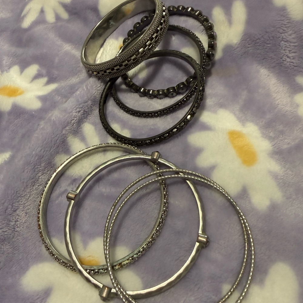 Stylish Silver and Black Bangle Set
You get all for one low price - Picture 3 of 12